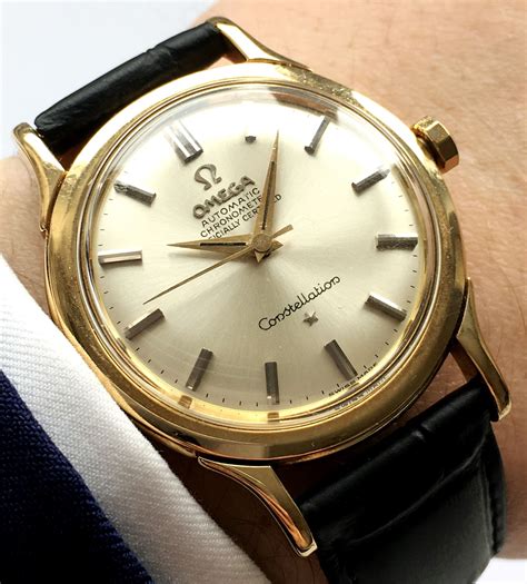 omega constellation gold watch.